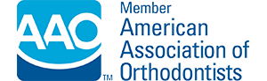 The image is a logo for the American Academy of Orthopaedic Surgeons AAOS , which features a shield with the organization s name and a depiction of a hand and an arm, along with the letters AAOS in bold blue letters.